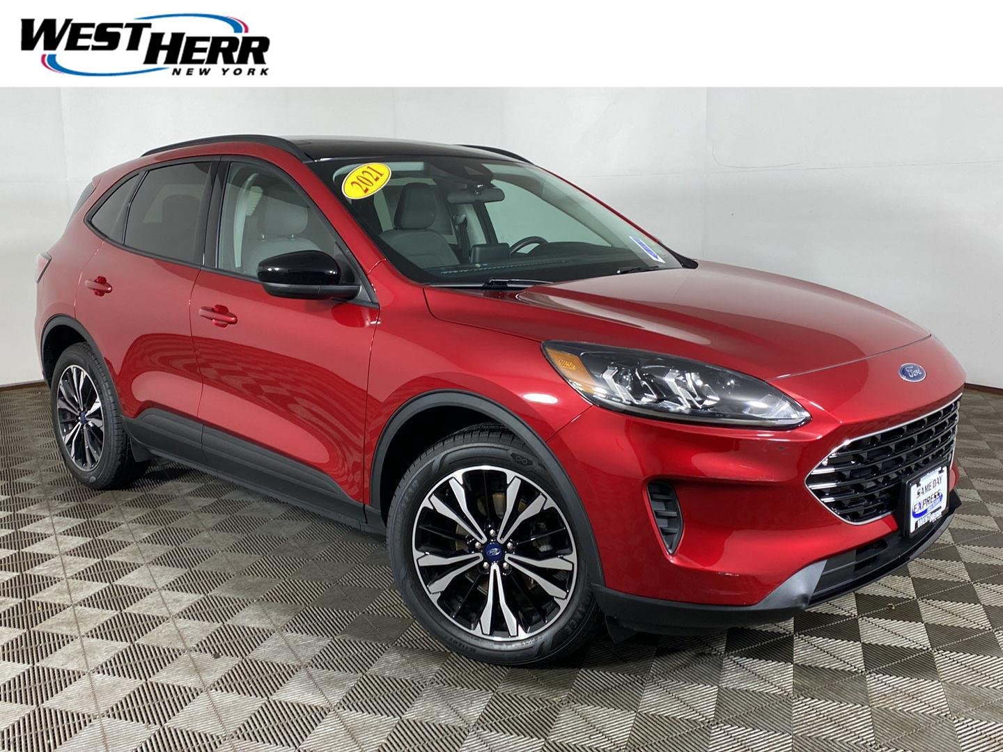 Used 2021 Red Metallic Ford SE image 1