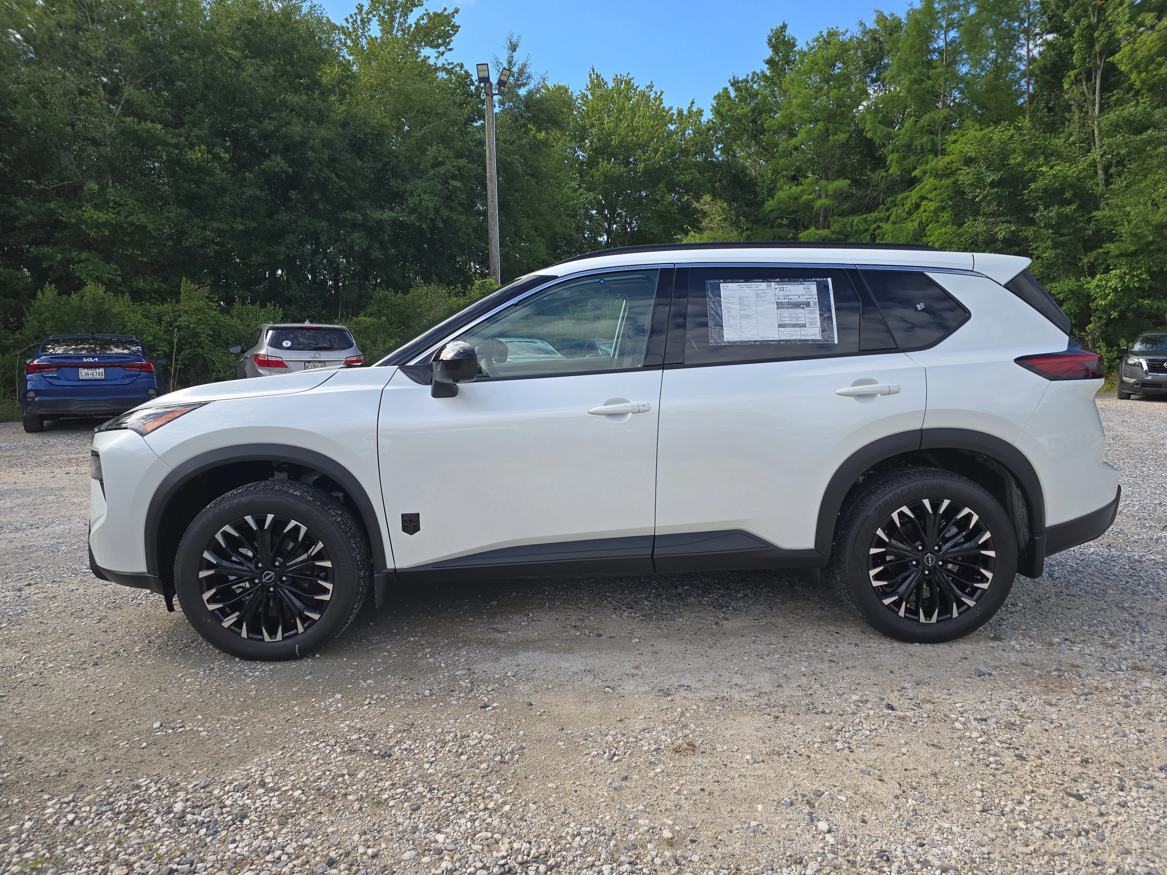 New 2026 Everest White Pearl TriCoat Nissan Dark Armor™ image 5