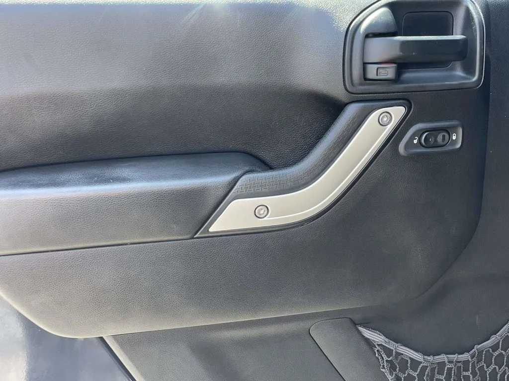 Used 2016 Black Jeep Unlimited Sahara image 23