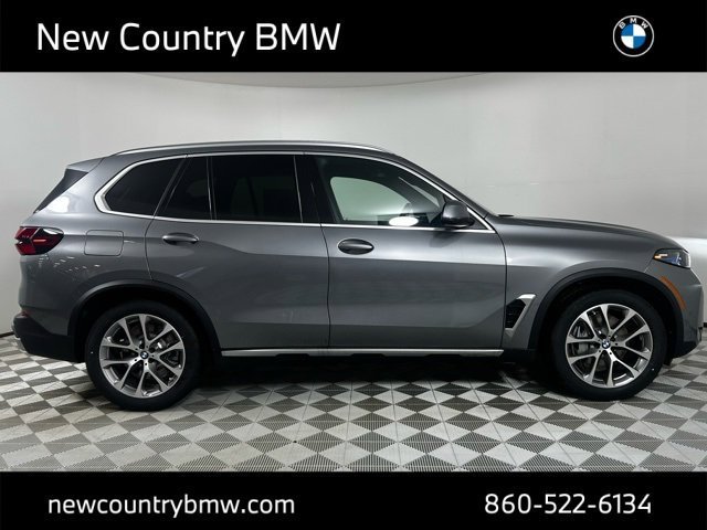 Used 2026 Skyscraper Grey Metallic BMW xDrive50e image 9