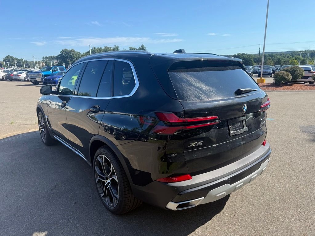 New 2026 Black Sapphire Metallic BMW xDrive40i image 3