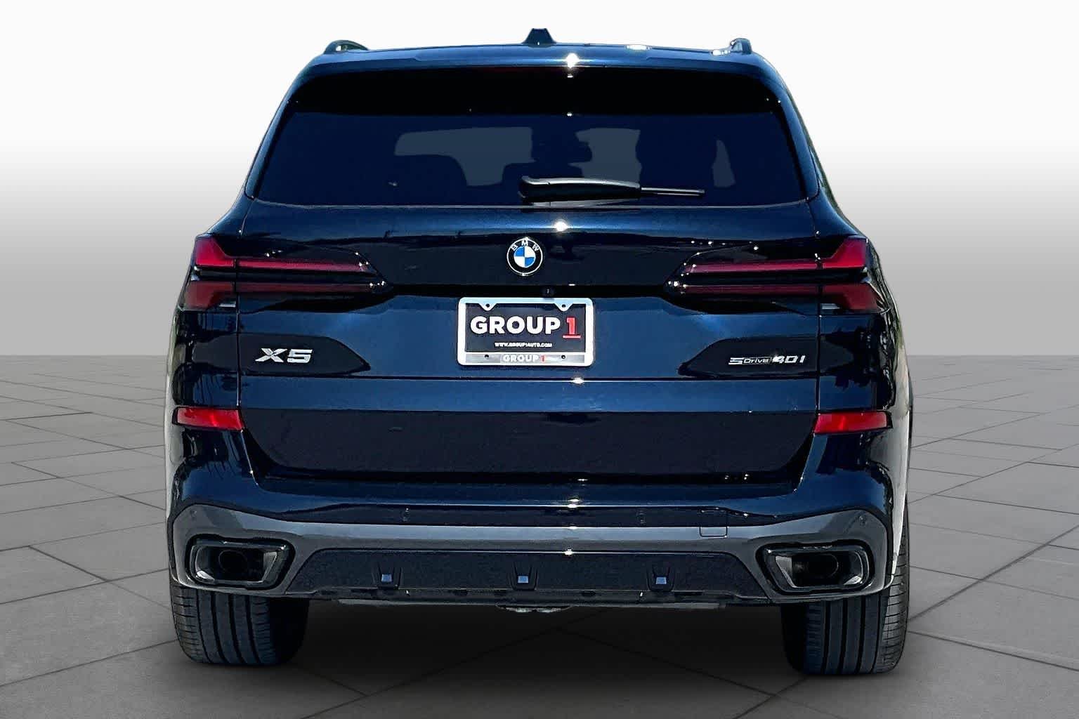 Used 2026 Black Sapphire Metallic BMW sDrive40i image 4