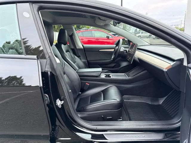 Used 2023 Solid Black Tesla Base image 9