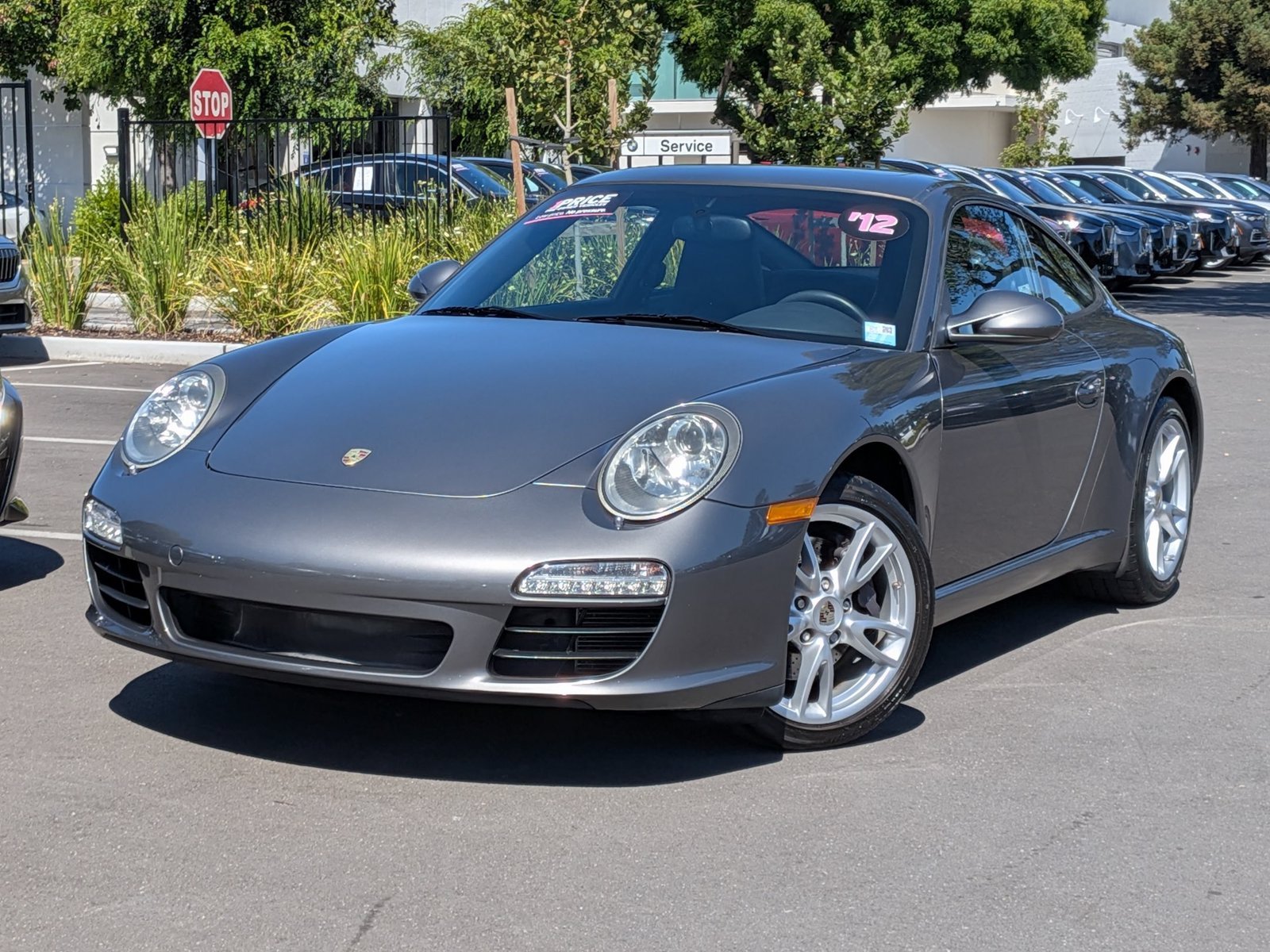 Used 2012 Meteor Grey Metallic Porsche 997 Carrera image 1