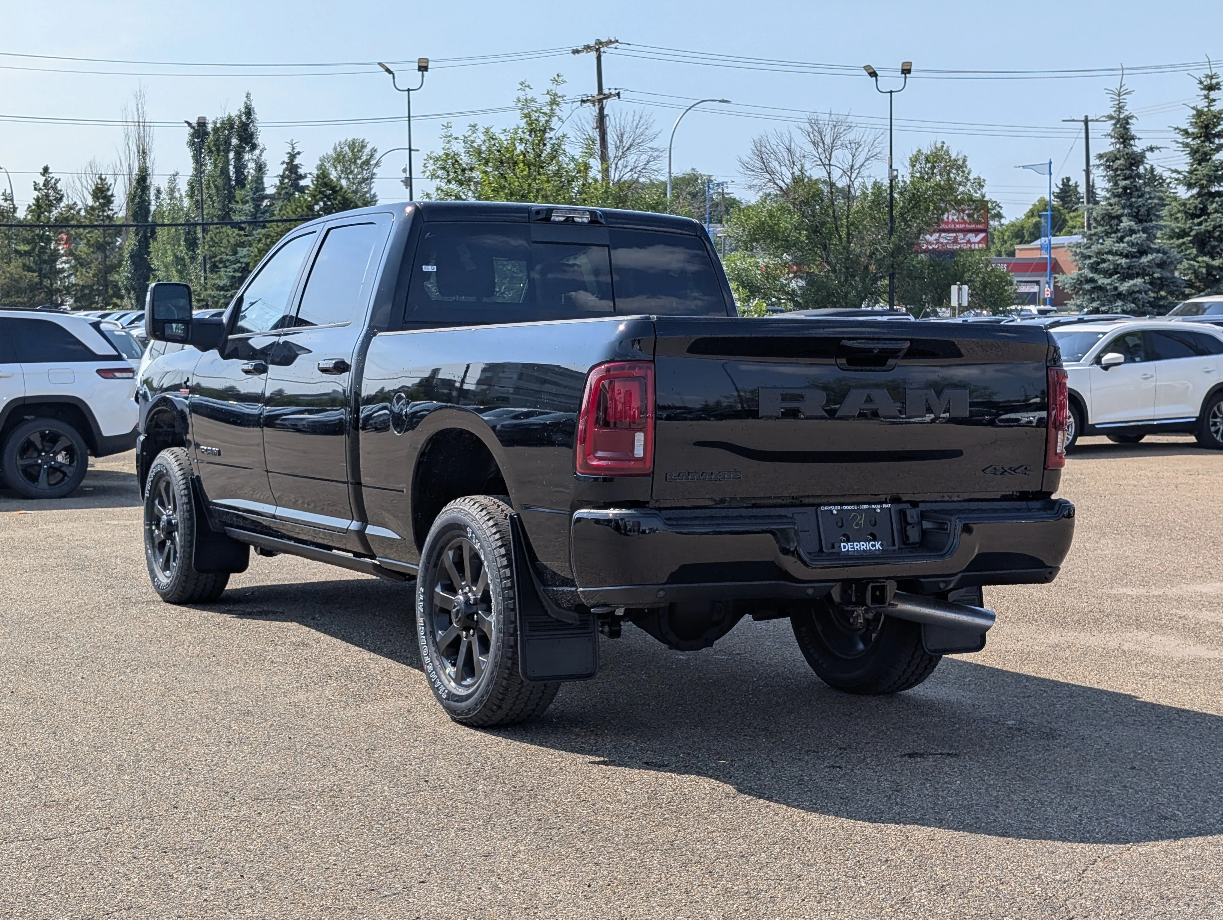 New 2026 Diamond Black Crystal Pearlcoat Ram Laramie image 4