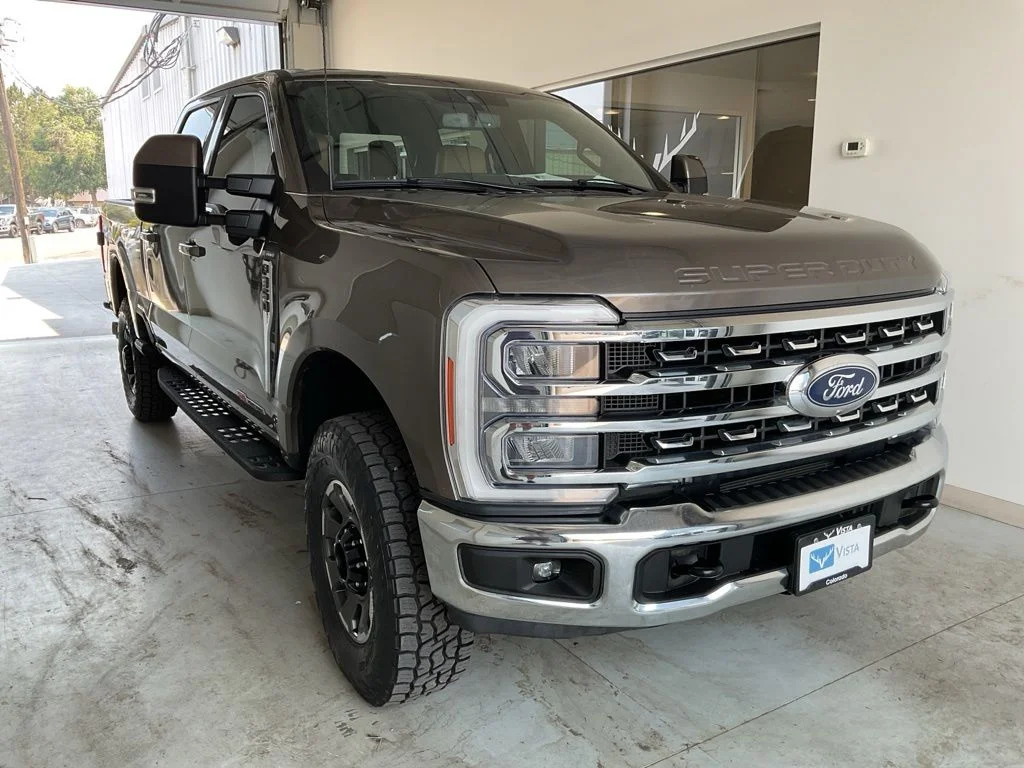 Used 2023 Stone Gray Metallic Ford Lariat image 1