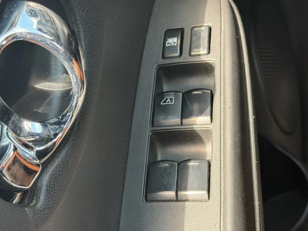 Used 2014 Metallic Peacock Nissan SV image 30