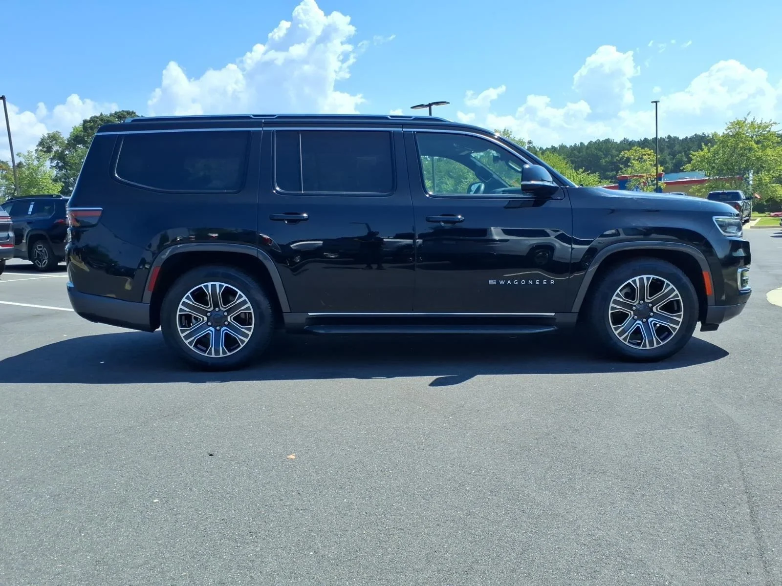 Used 2022 Diamond Black Crystal Pearlcoat Jeep Series III image 12
