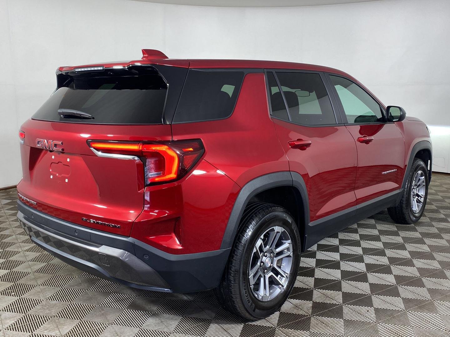 Used 2026 Volcanic Red Tintcoat GMC AWD Elevation image 3