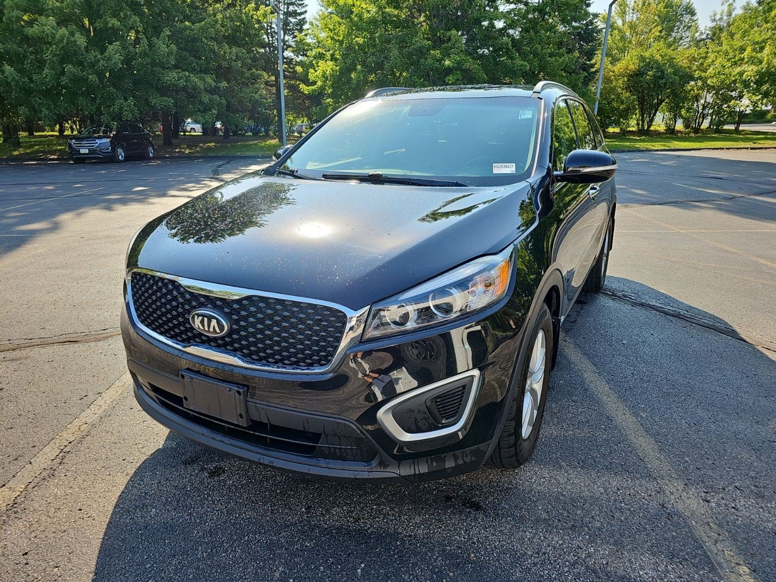 Used 2017 Ebony Black Kia LX image 2