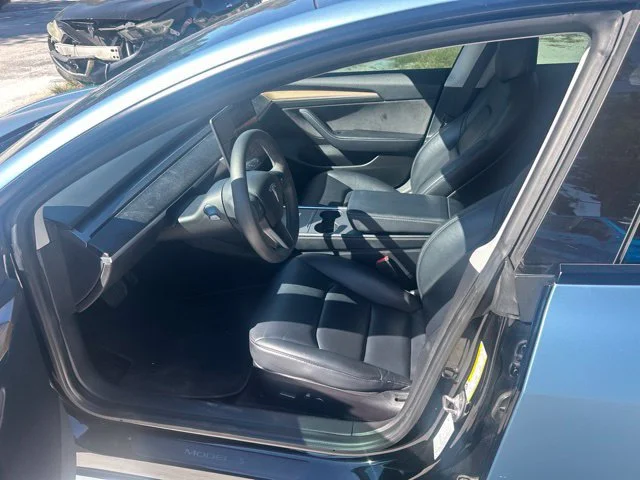 Used 2021 Solid Black Tesla Standard Range Plus image 5