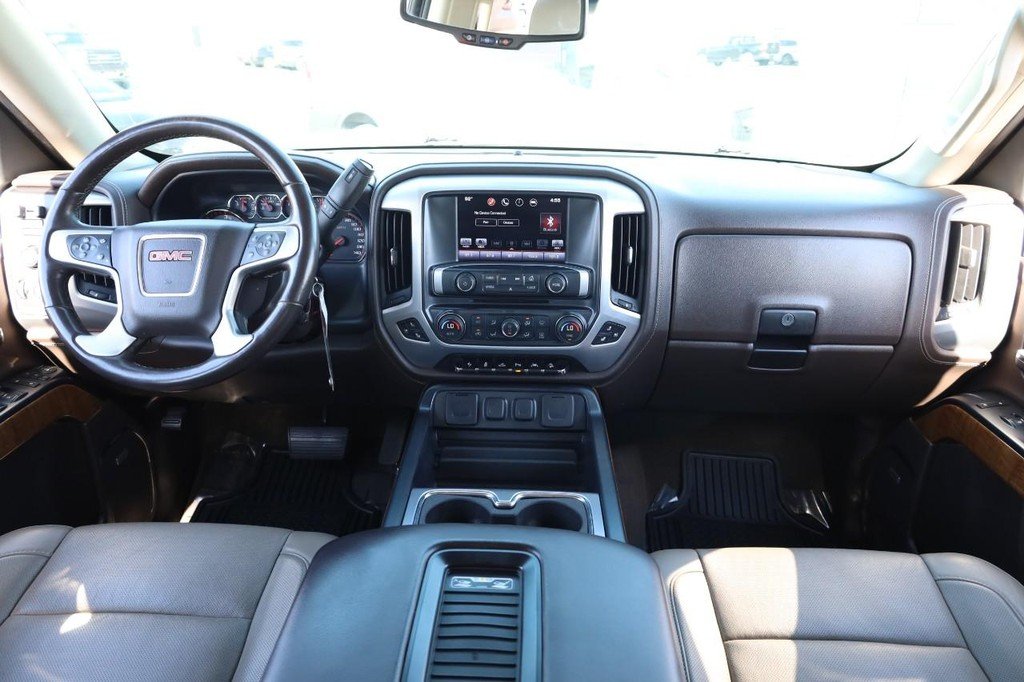 Used 2016 Summit White GMC 4WD Crew Cab 143.5" SLT image 24
