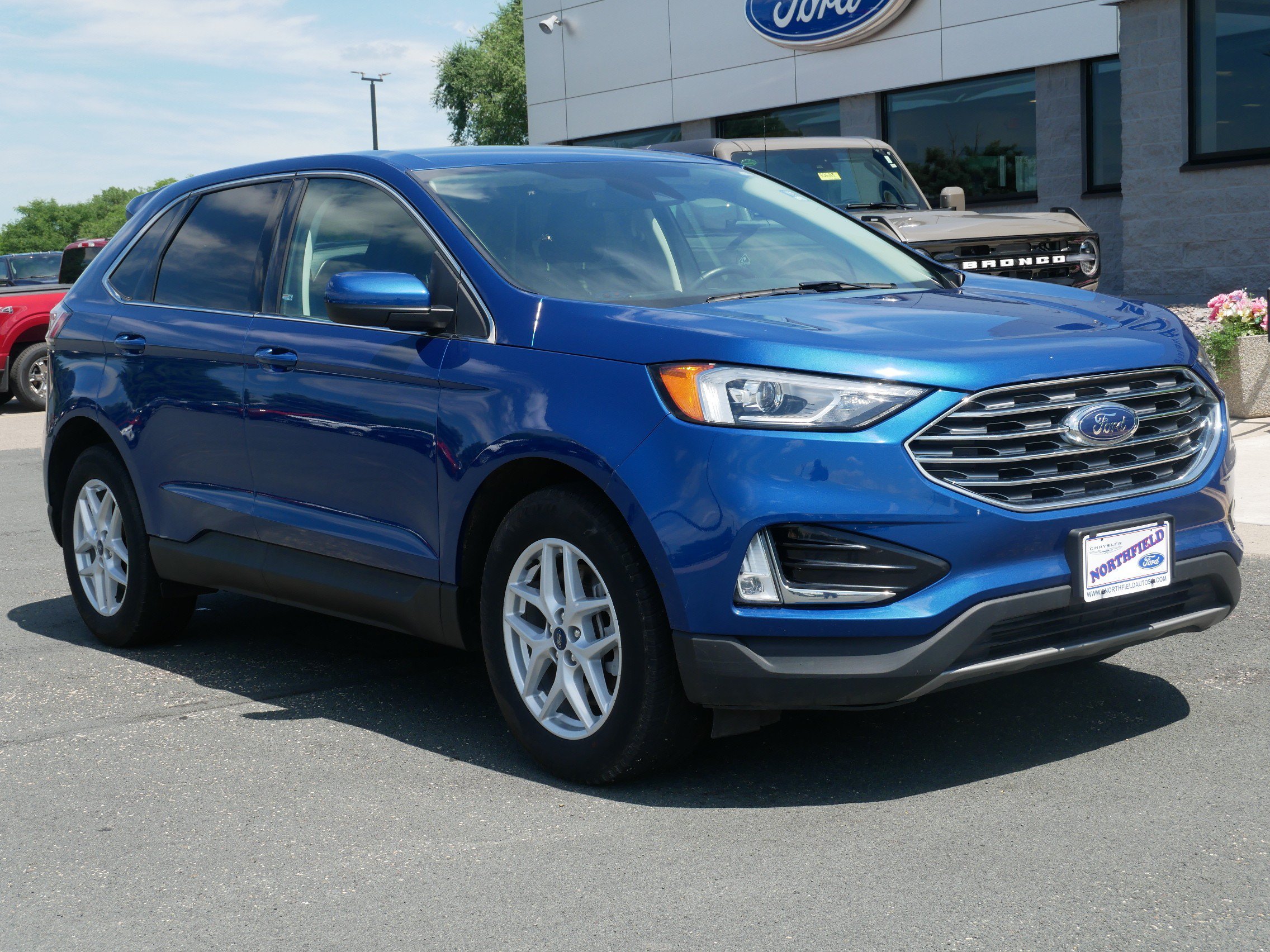 Used 2021 Ford Edge SEL with VIN 2FMPK4J93MBA50114 for sale in Northfield, Minnesota