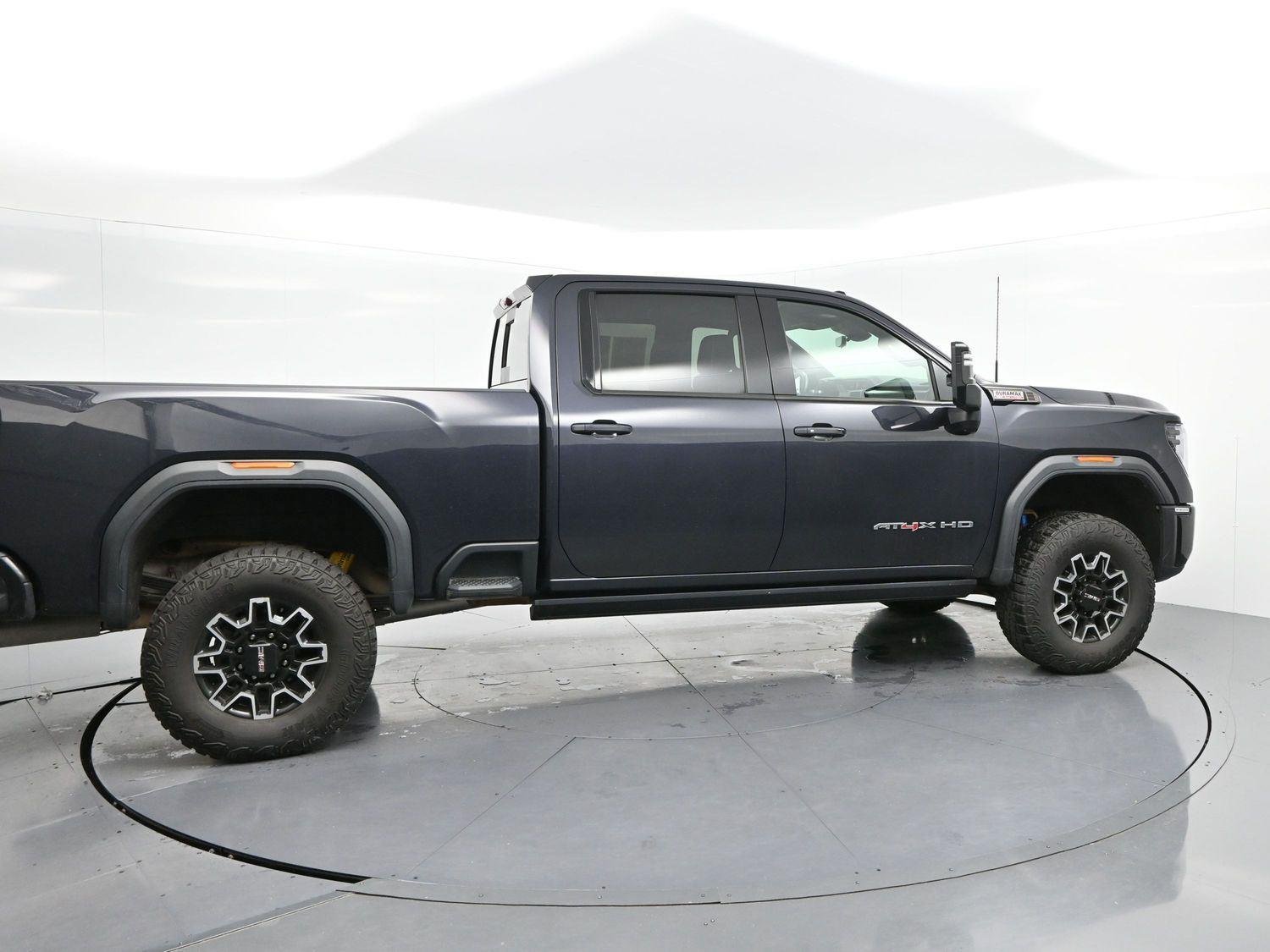 Used 2024 Titanium Rush Metallic GMC AT4X image 8