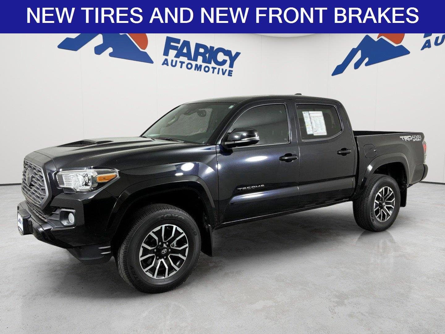 Used 2021 Midnight Black Metallic Toyota TRD Sport image 1