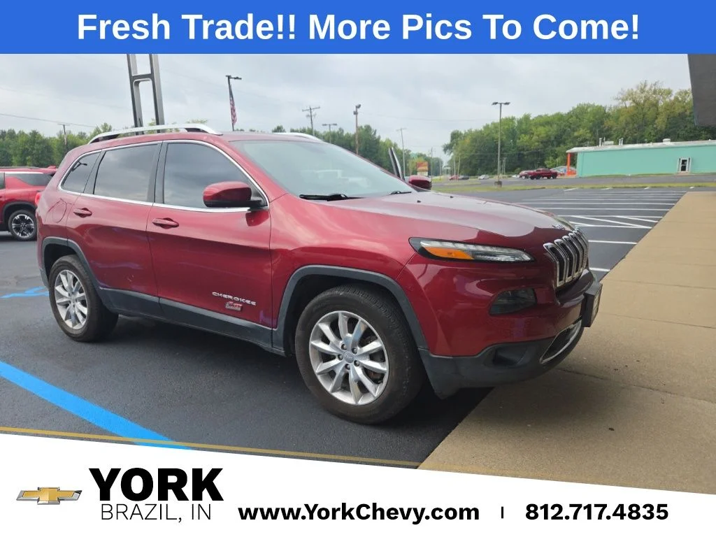 Used 2016 Red Jeep Limited image 1