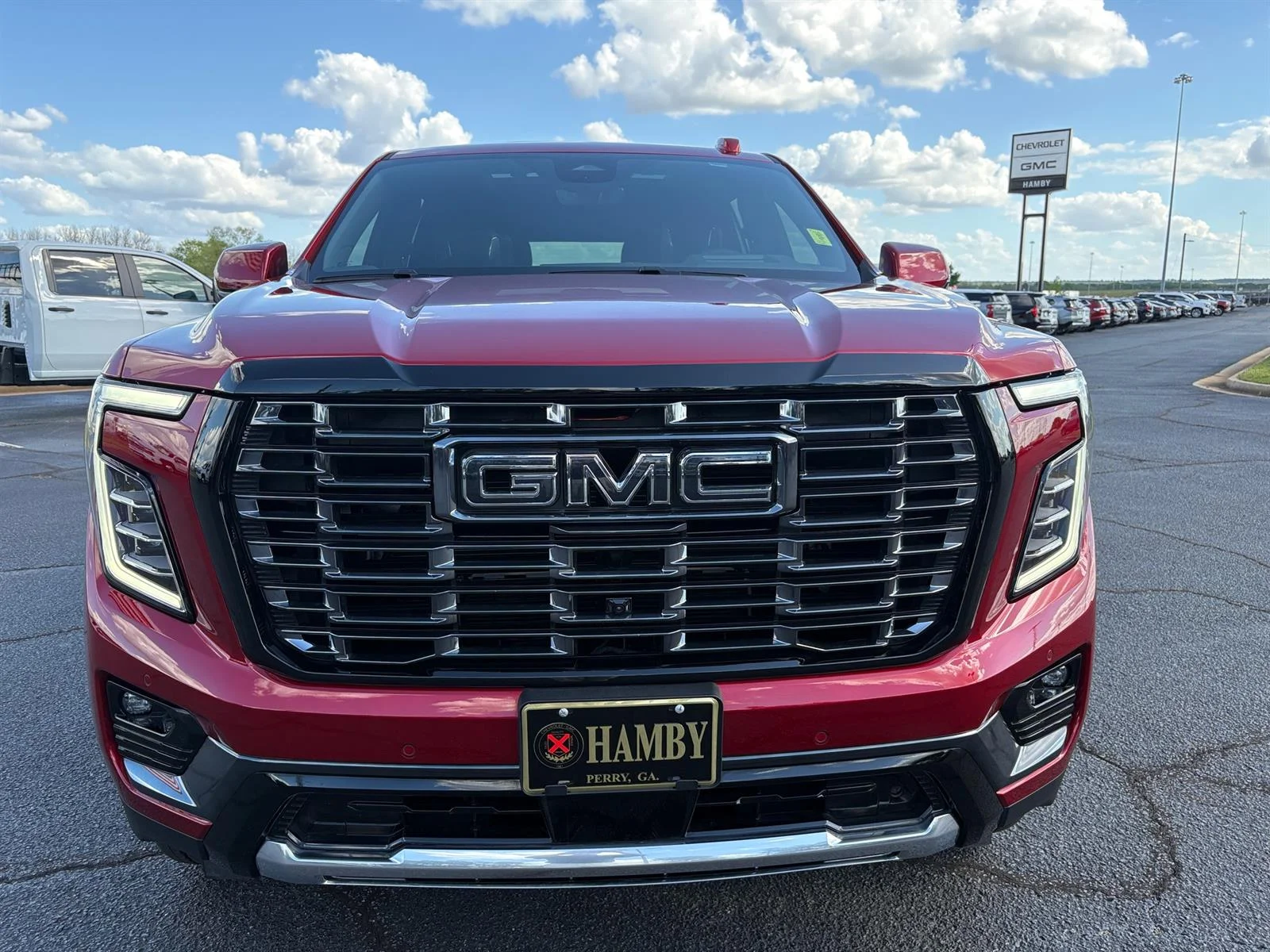 Used 2026 Volcanic Red Tintcoat GMC Denali Ultimate image 15