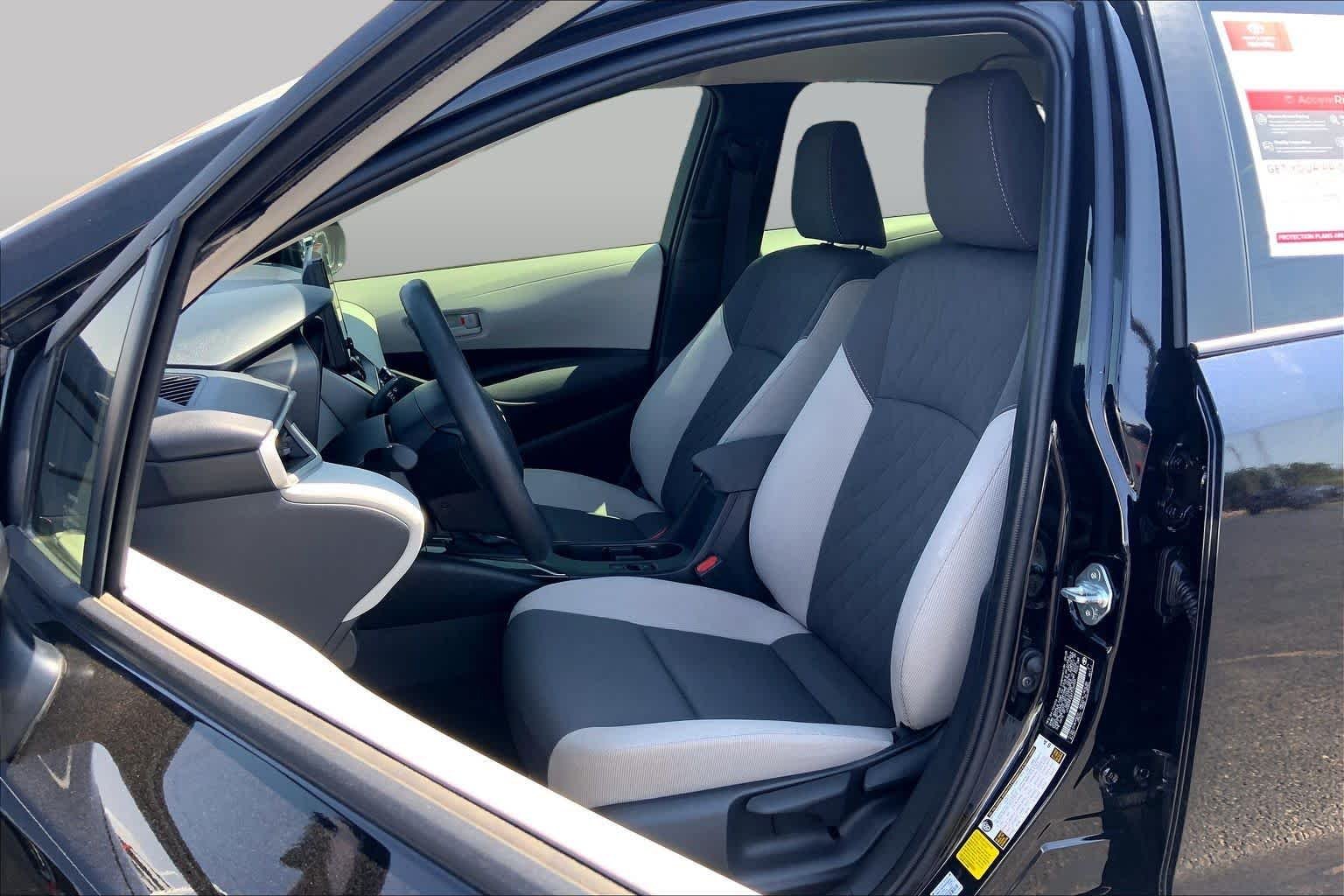 Used 2026 Midnight Black Metallic Toyota Hybrid LE image 8