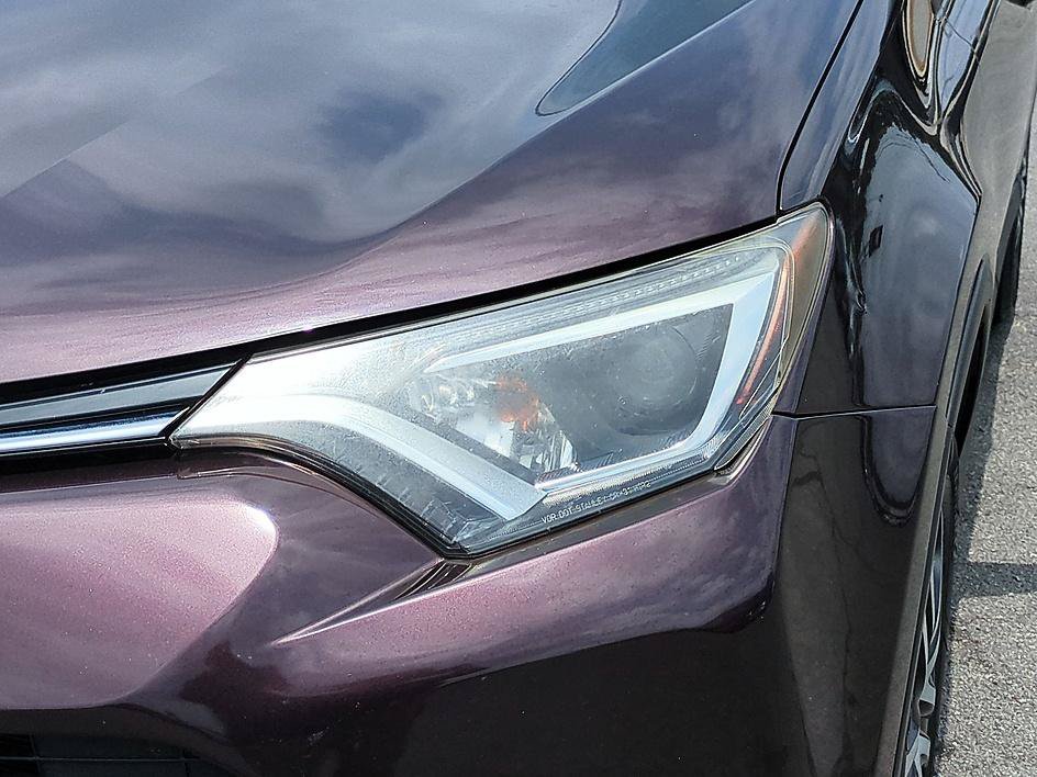 Used 2016 Black Currant Metallic Toyota LE image 9