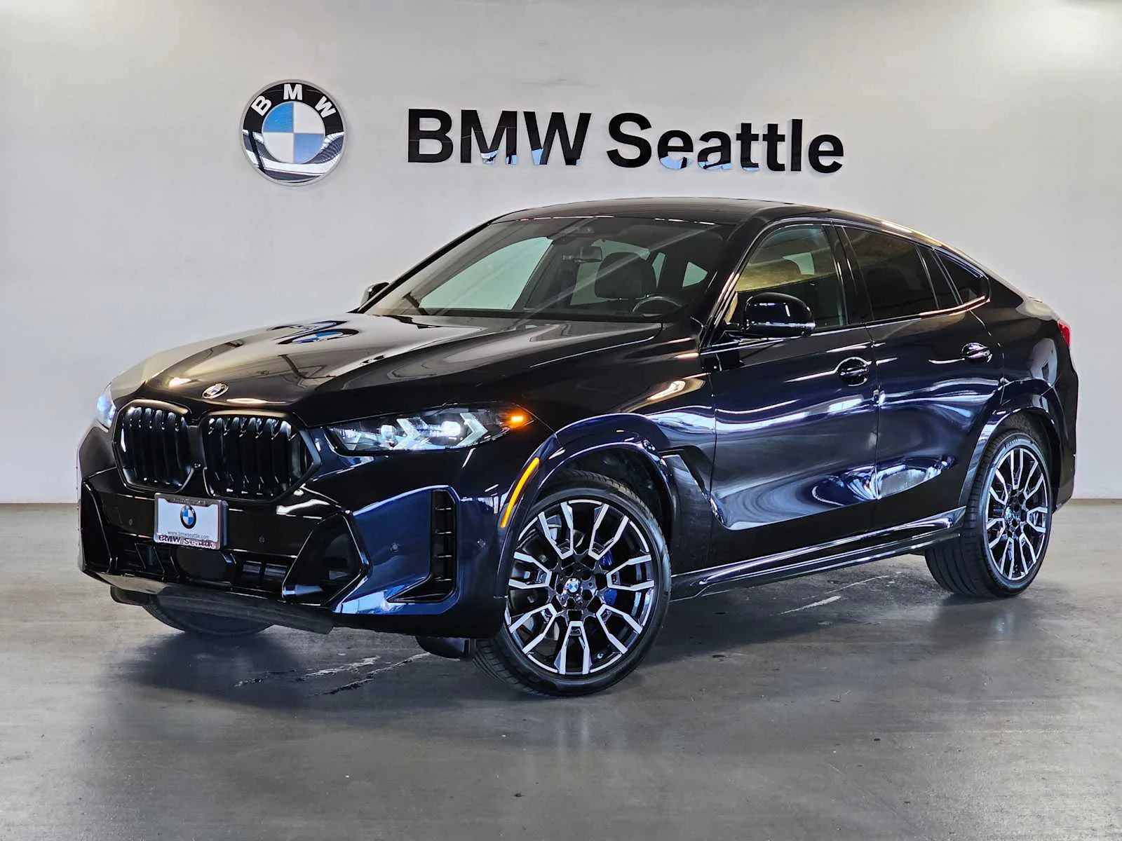 Used 2024 Carbon Black Metallic BMW xDrive40i image 1