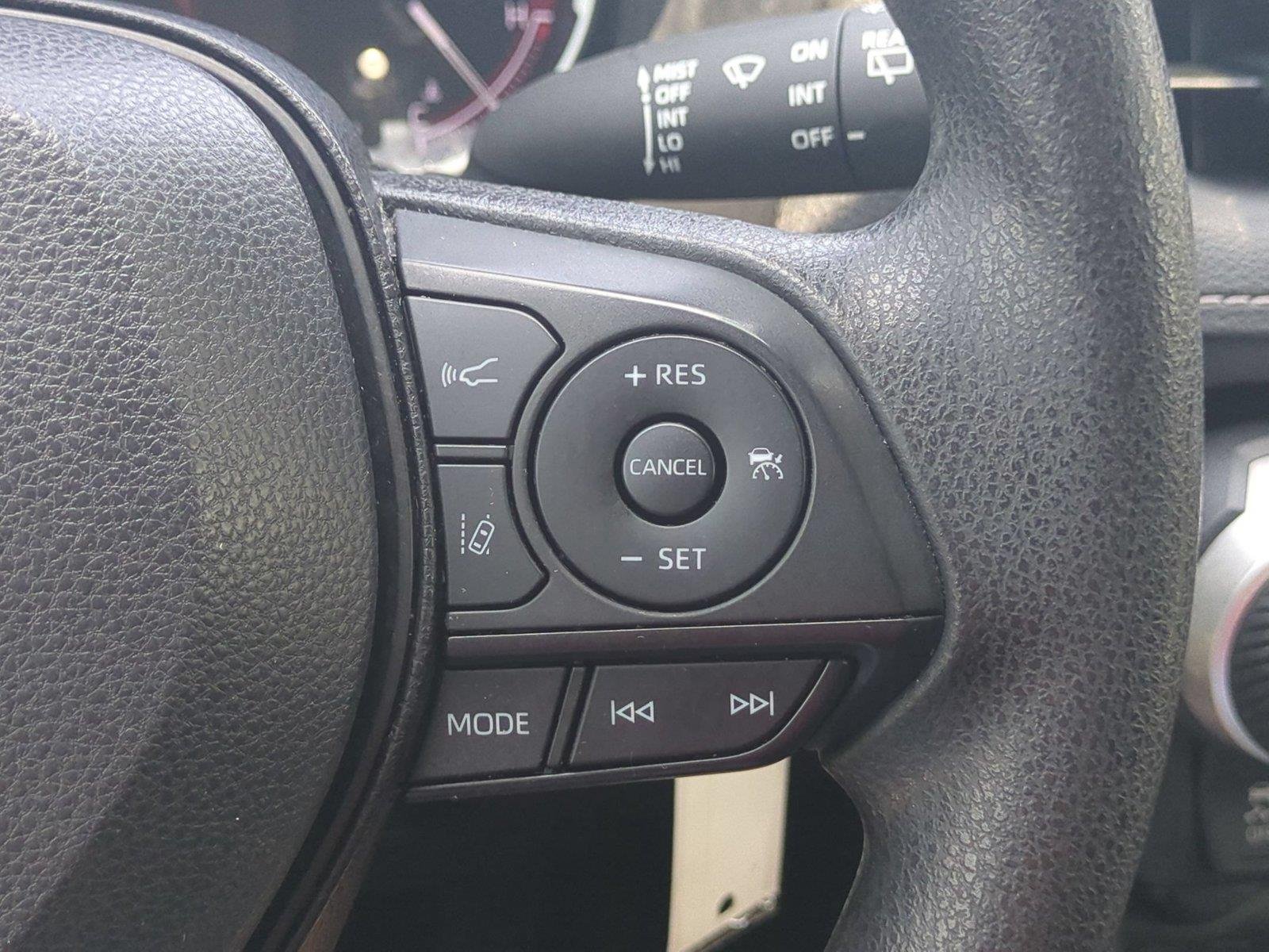 Used 2023 Magnetic Gray Metallic Toyota LE image 21