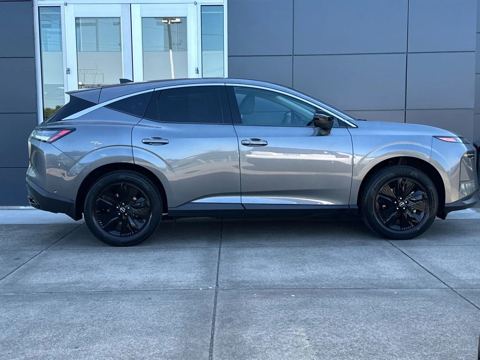 Used 2025 Gun Metallic Nissan SV image 2