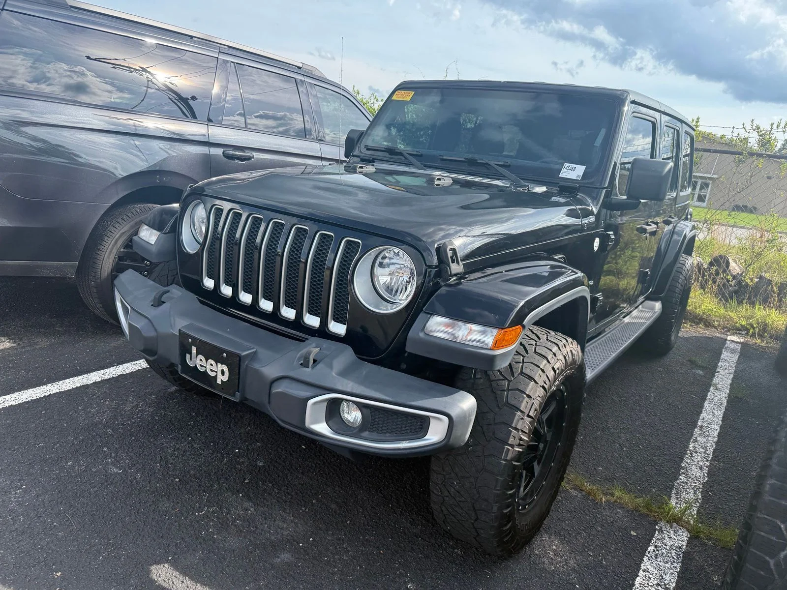 Used 2019 Black Jeep Unlimited Sahara image 2