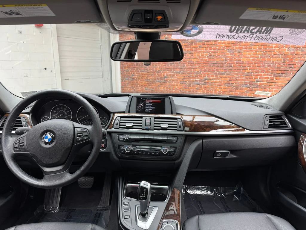 Used 2015 Black BMW 320i xDrive image 13