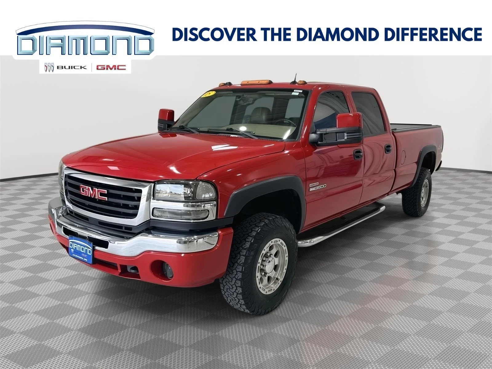 2005 GMC Sierra 4WD Crew Cab SLT's photo