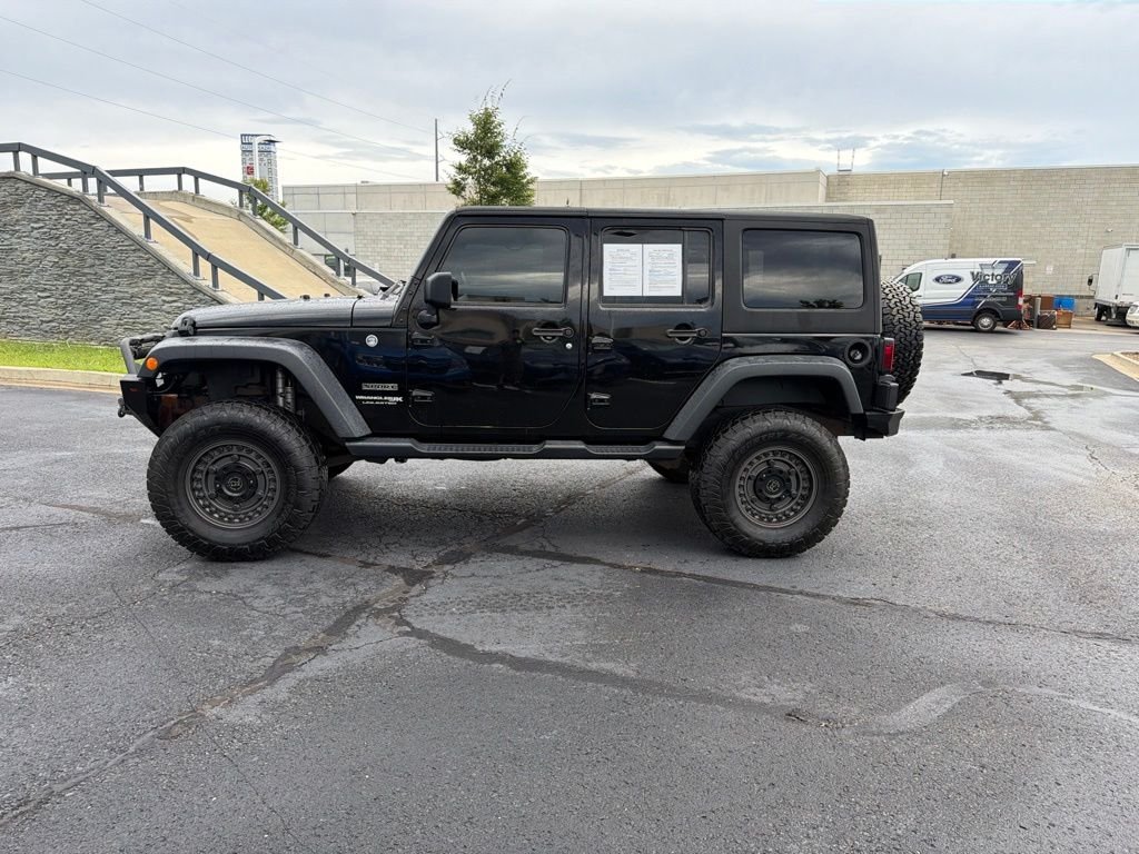 Used 2018 Black Jeep Unlimited Sport image 4