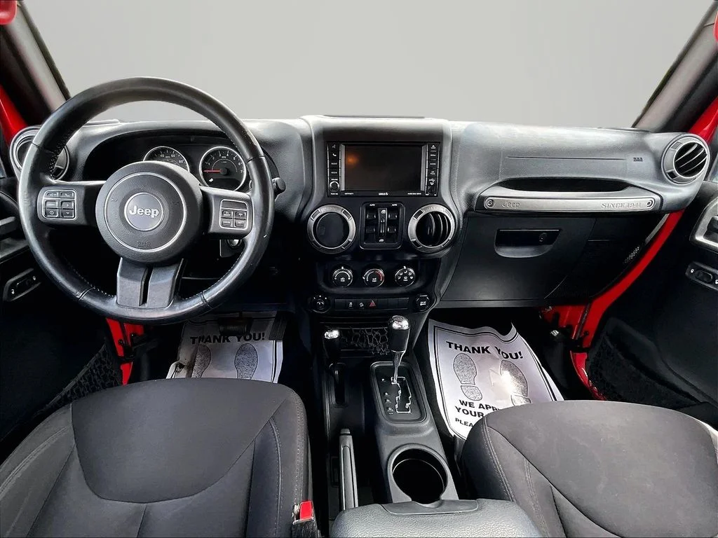 Used 2015 Red Jeep Unlimited Sport image 14
