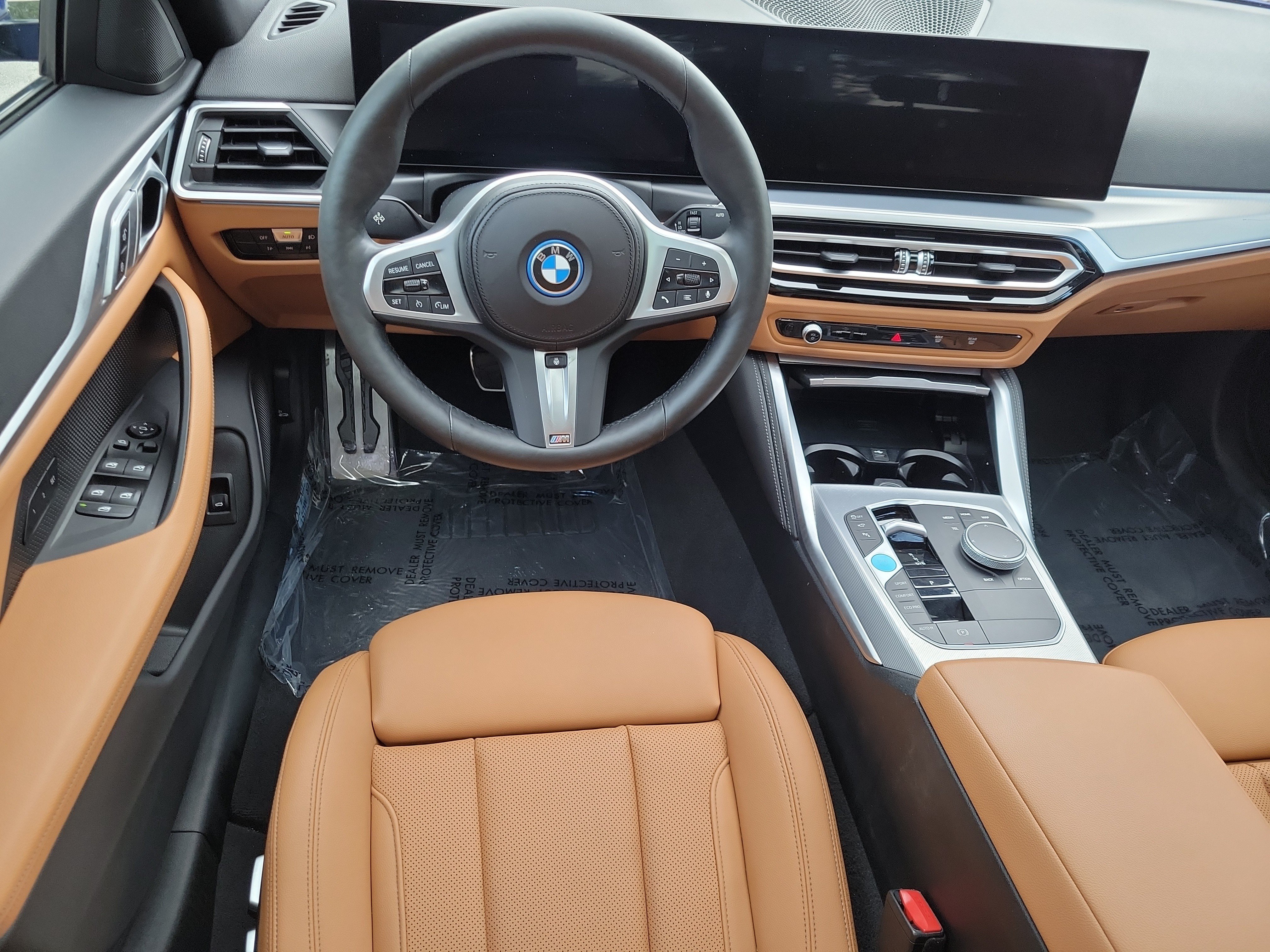 Certified Used 2024 Portimao Blue Metallic BMW eDrive40 image 7