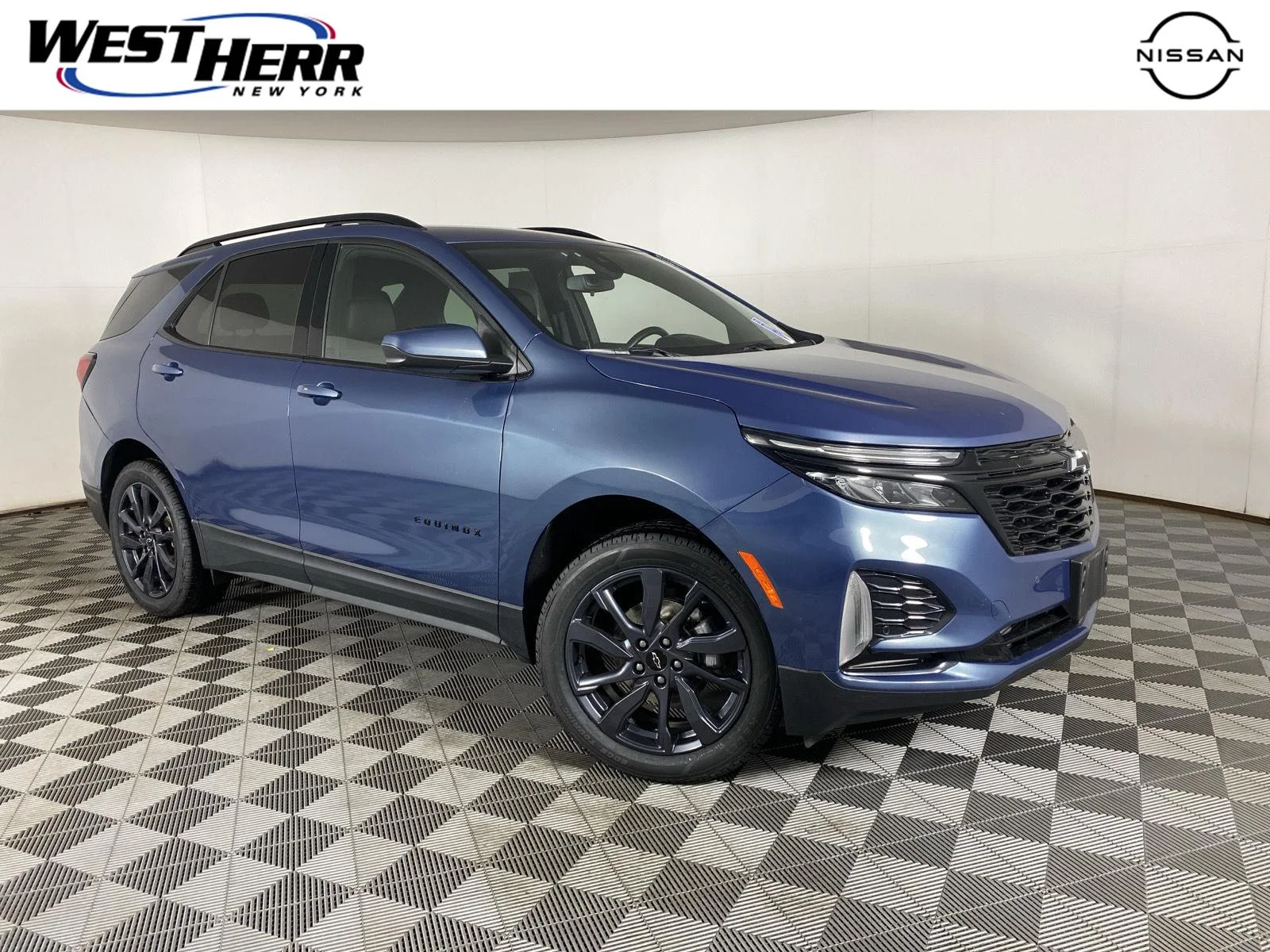 Used 2024 Lakeshore Blue Metallic Chevrolet RS image 1