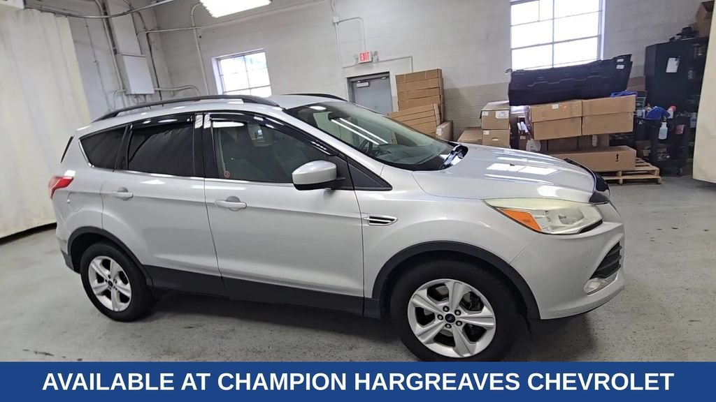 Used 2014 Ford Escape SE with VIN 1FMCU9GX2EUC70819 for sale in Royal Oak, MI