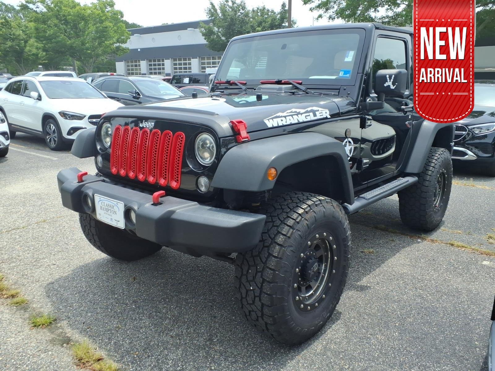Used 2017 Black Clearcoat Jeep Sport image 1