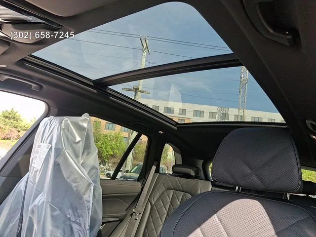 New 2026 Skyscraper Grey Metallic BMW xDrive50e image 13