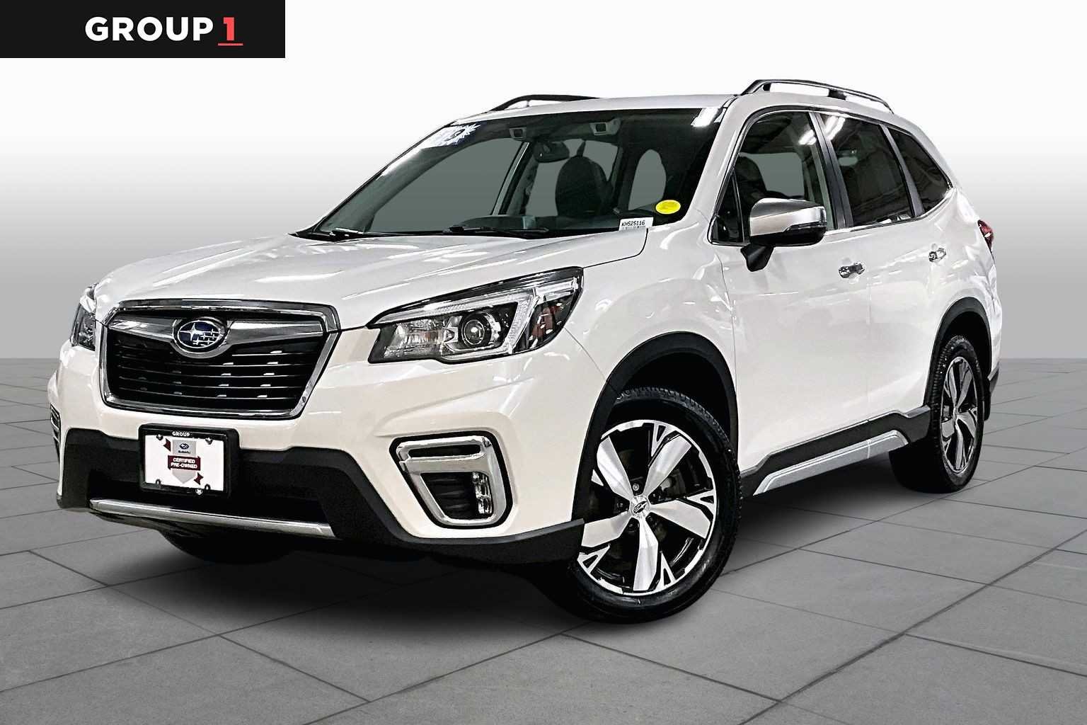 Used 2019 Crystal White Pearl Subaru Touring image 1
