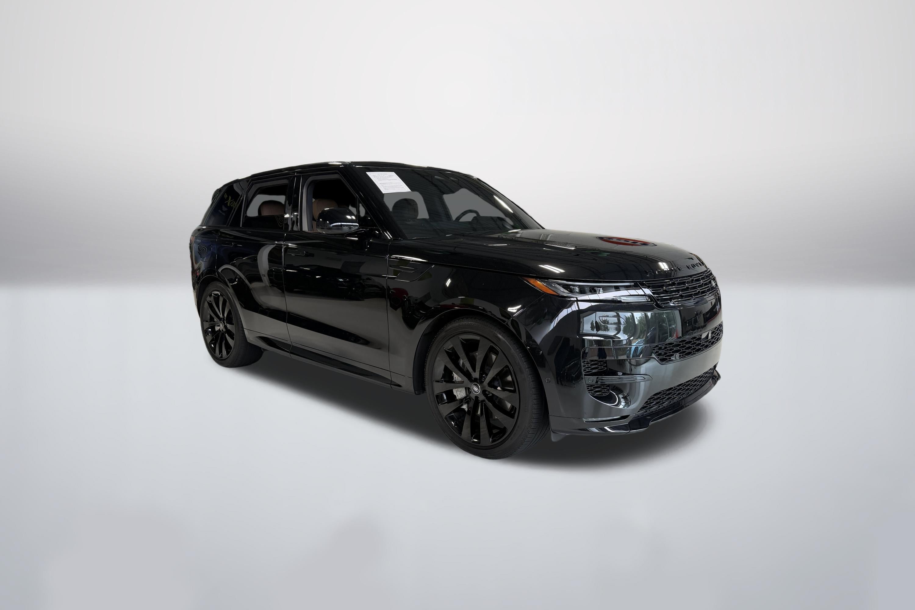 Used 2025 Santorini Black Metallic Land Rover Dynamic SE image 1