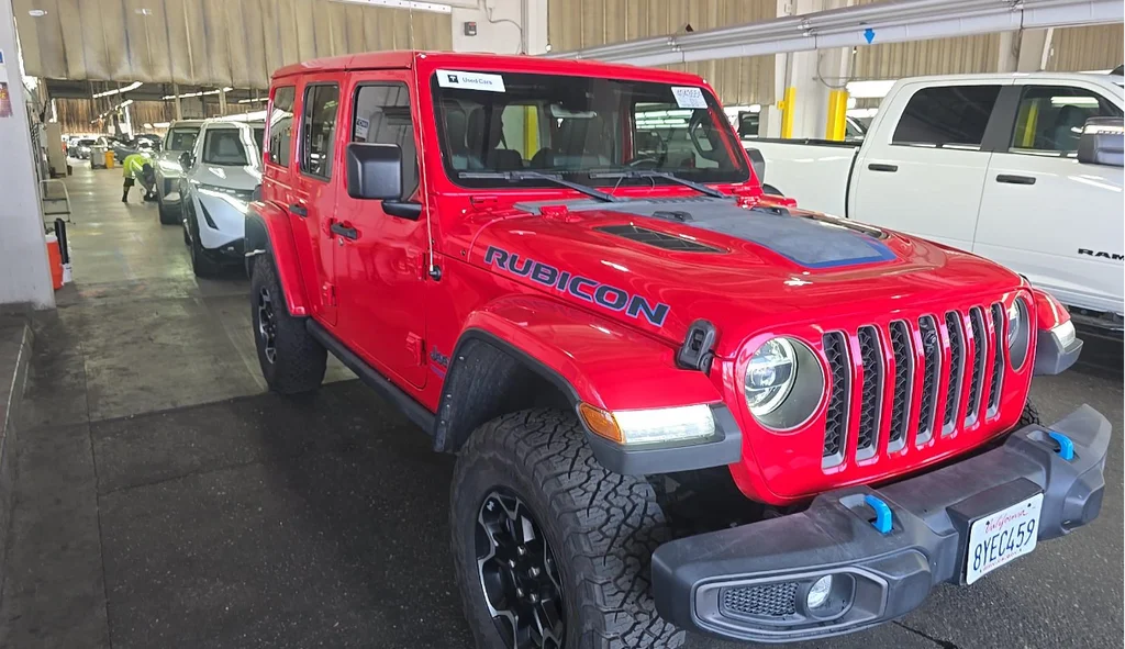 Used 2021 Red Jeep Unlimited Rubicon 4xe image 1