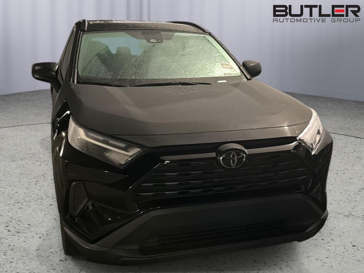 Used 2025 Midnight Black Metallic Toyota Hybrid LE image 4