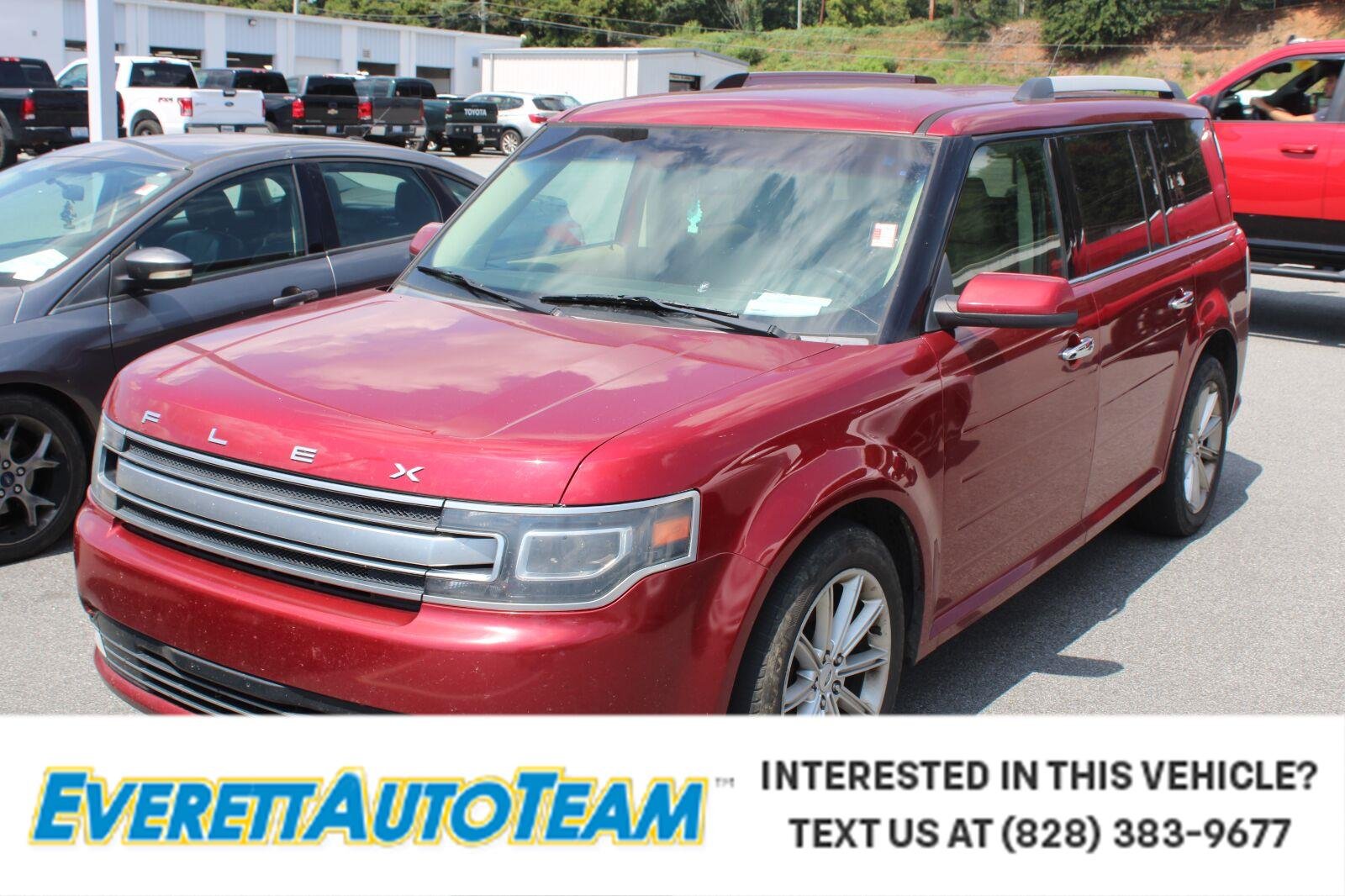 Used 2014 Ruby Red Metallic Tinted Clearcoat Ford Limited image 1