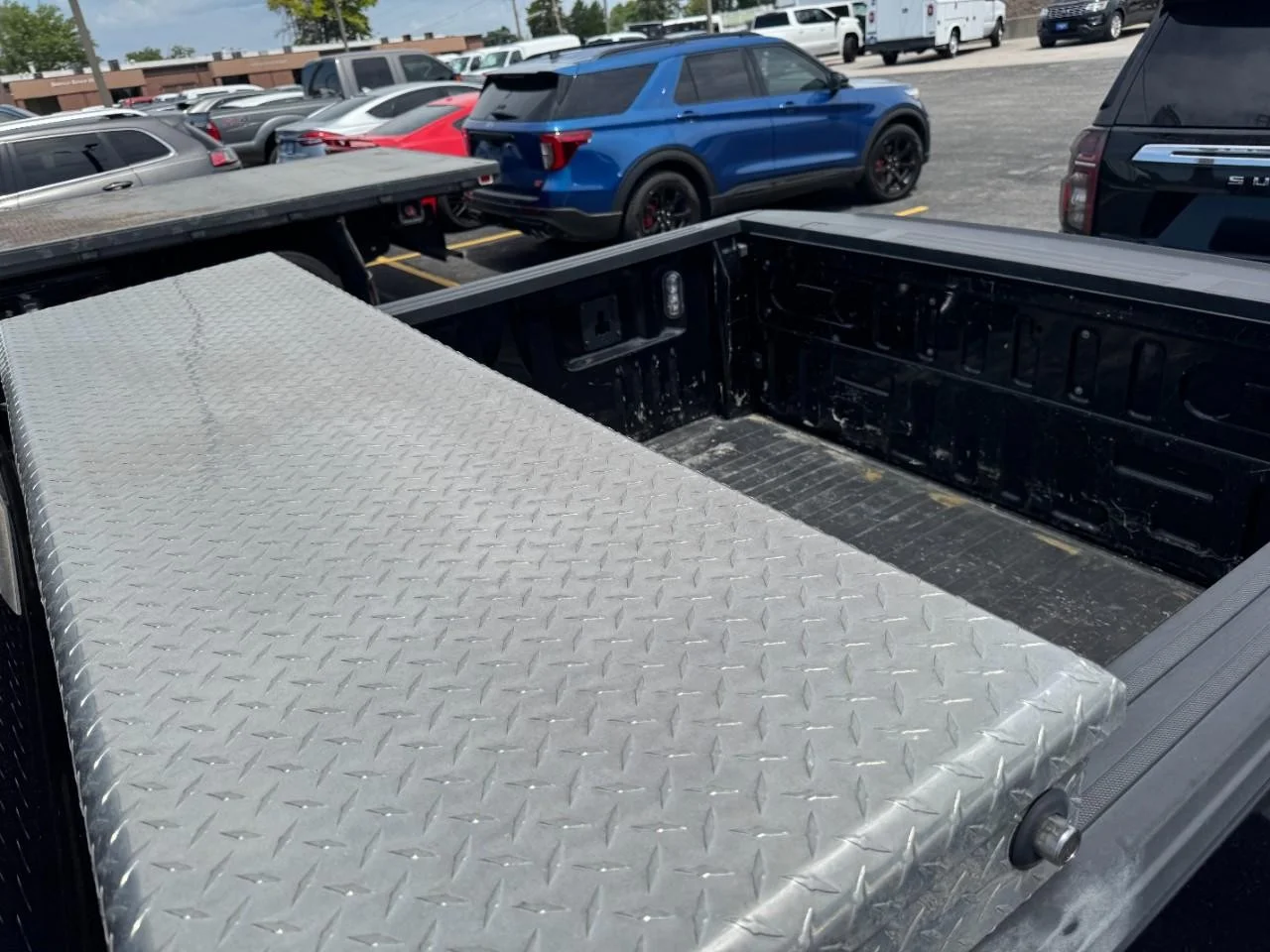 Used 2021 Agate Black Metallic Ford XLT 4WD SuperCrew 5.5' Box image 8