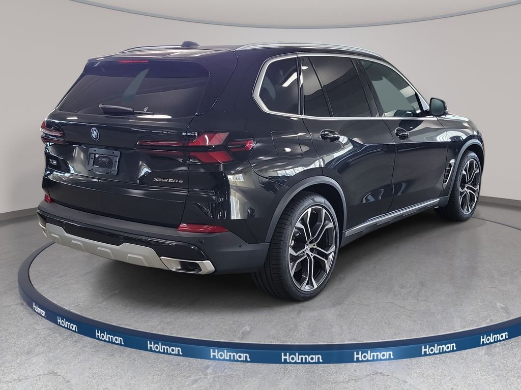 New 2026 Black Sapphire Metallic BMW xDrive50e image 4