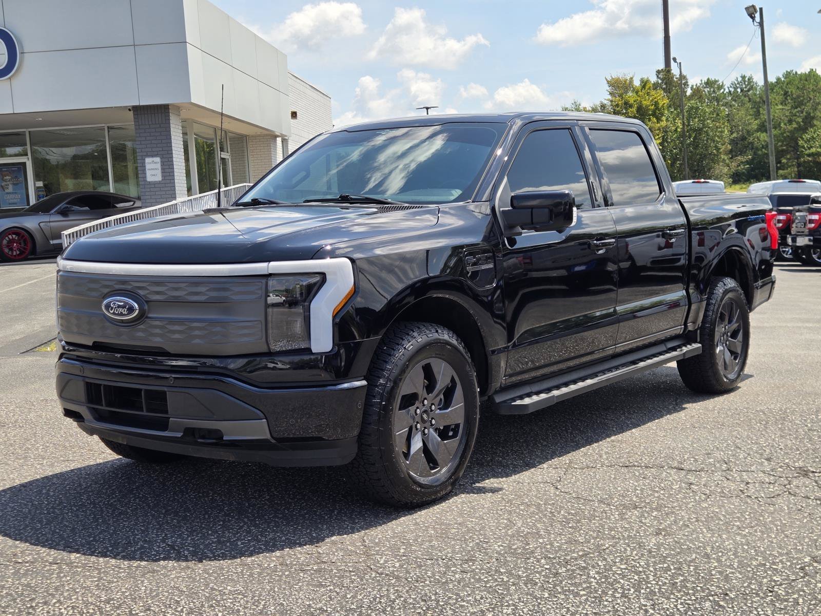 Certified 2023 Ford F-150 Lightning Lariat with VIN 1FTVW1EV7PWG53284 for sale in Auburn, AL