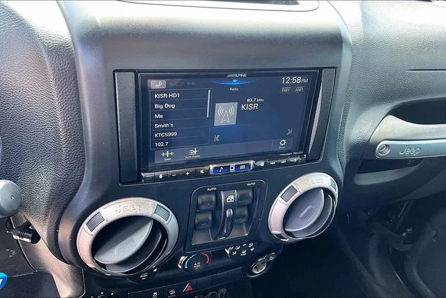 Used 2013 Black Jeep Unlimited Sport image 17