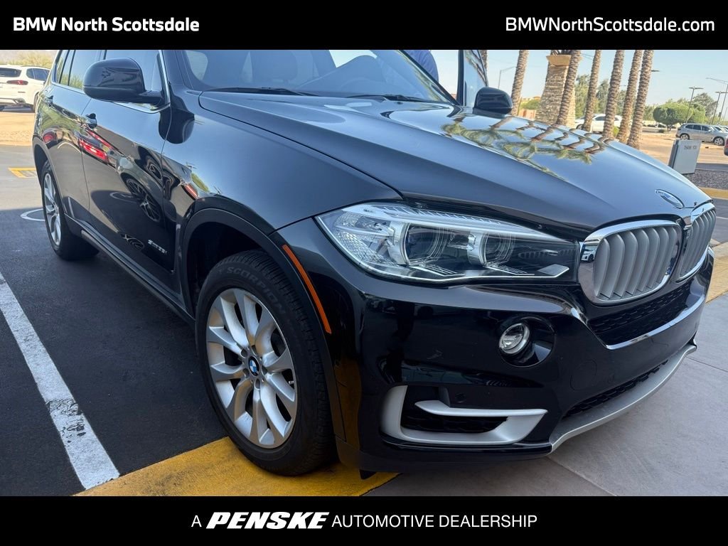 Used 2018 Black Sapphire Metallic BMW sDrive35i image 1