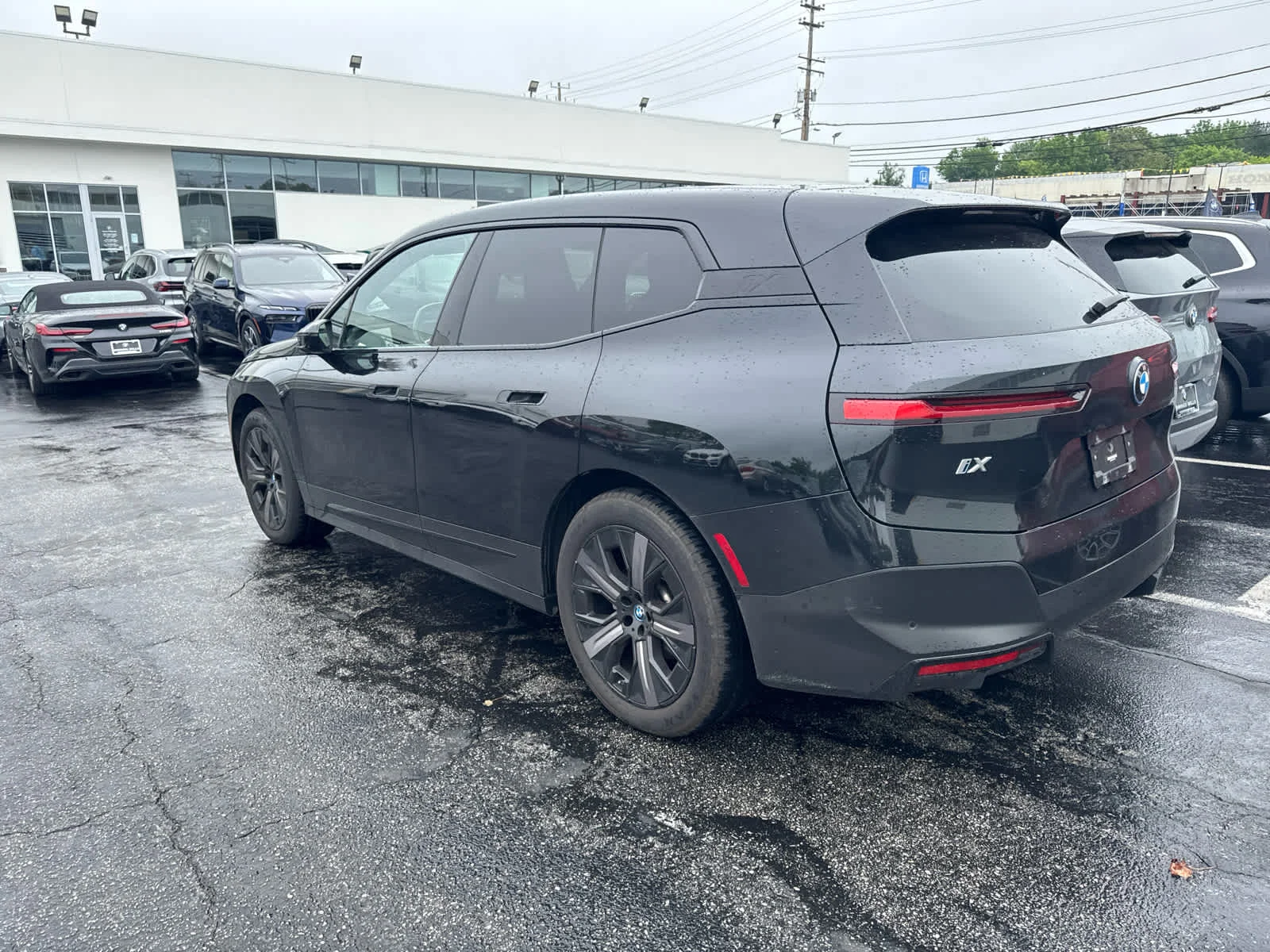 Certified Used 2024 Black Sapphire Metallic BMW xDrive50 image 5