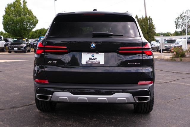 Certified Used 2025 Black Sapphire Metallic BMW xDrive40i image 9