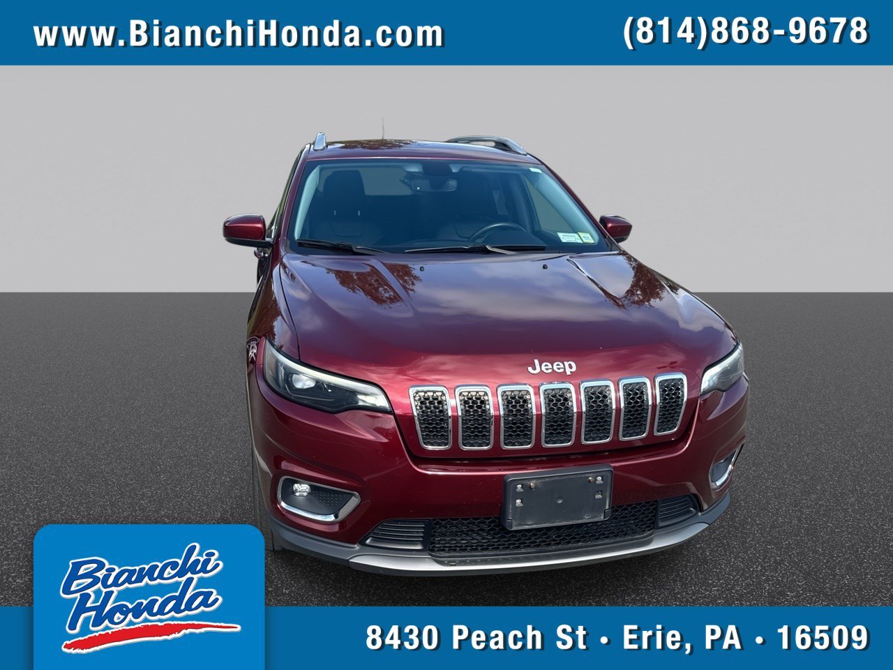 Used 2019 Velvet Red Pearlcoat Jeep Limited image 1