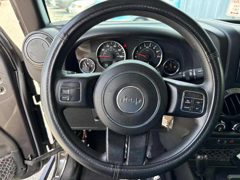 Used 2017 Gray Jeep Unlimited Sport image 38